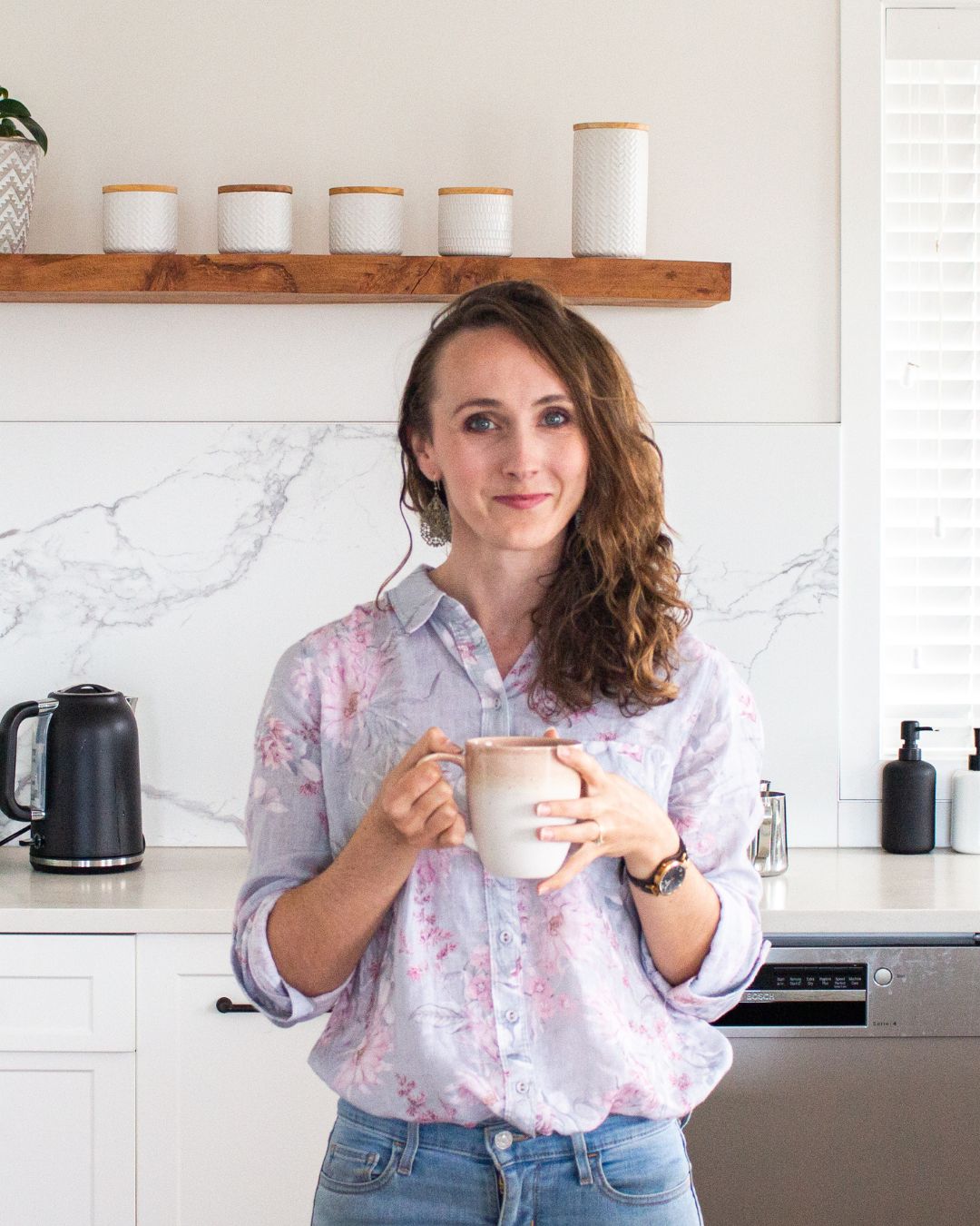 Alana Holding Coffee Cup